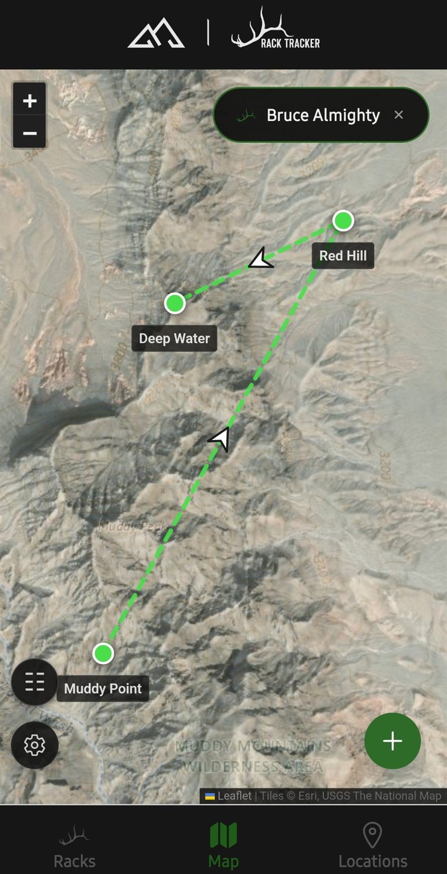 A movement path across a drainage with arrows showing travel direction